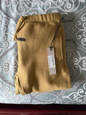 Fear of God Essentials Track Pants – Men’s XS – Amber